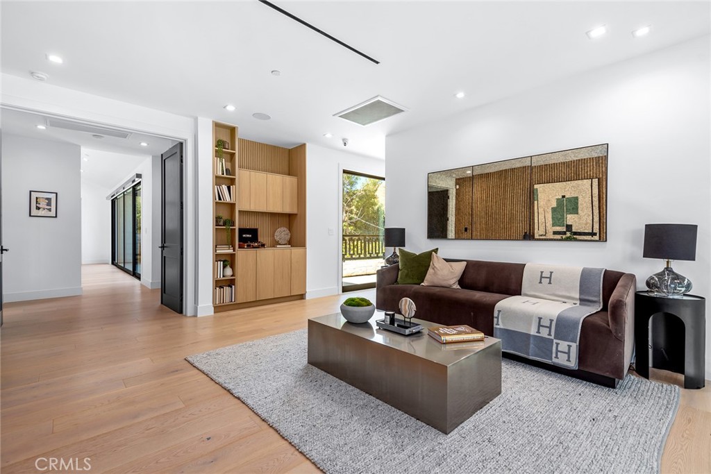 23650 Long Valley Road Hidden Hills, CA 91302 - Photo 27 of 57 a living room with furniture kitchen view and a window