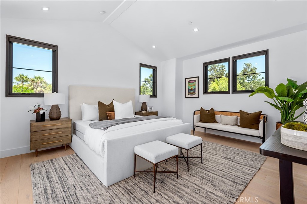23650 Long Valley Road Hidden Hills, CA 91302 - Photo 36 of 57 a living room with furniture and a couch