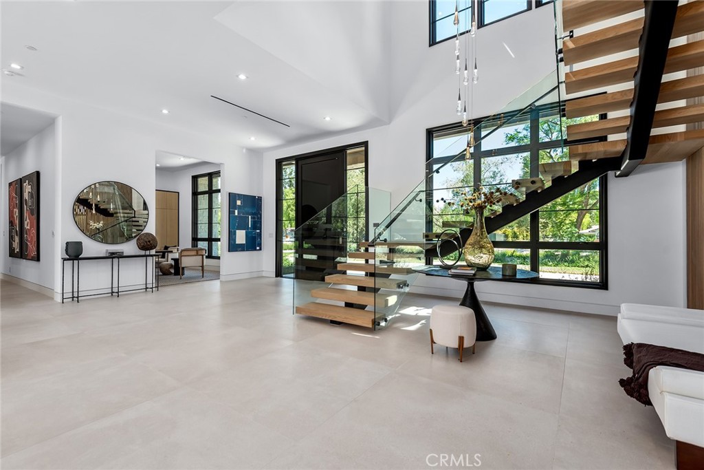23650 Long Valley Road Hidden Hills, CA 91302 - Photo 4 of 57 a living room with furniture and a large window