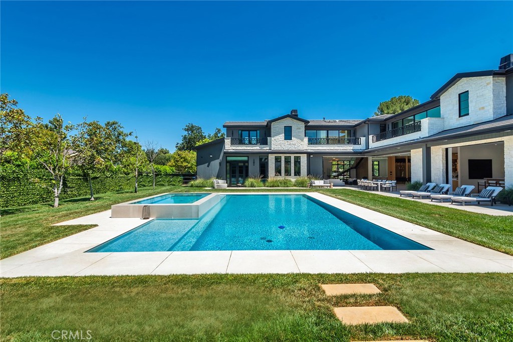 23650 Long Valley Road Hidden Hills, CA 91302 - Photo 51 of 57 a view of a house with swimming pool