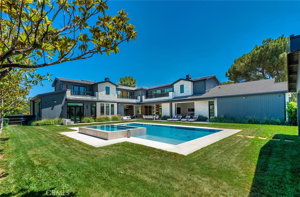 23650 Long Valley Road Hidden Hills, CA 91302 - Photo 52 of 57 front view of a house with a yard