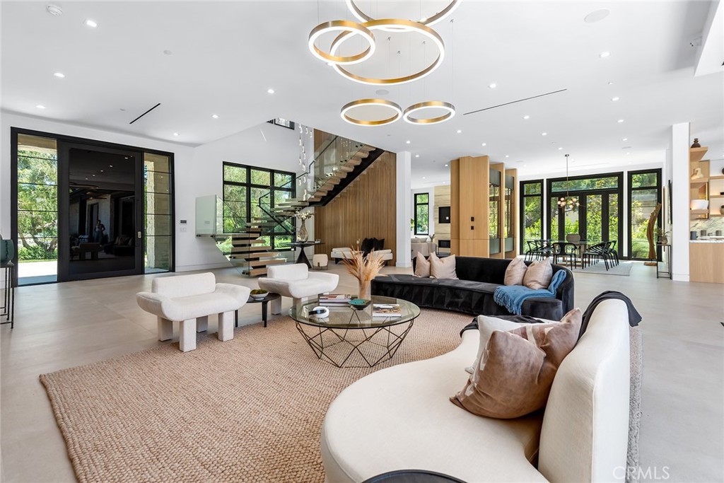 23650 Long Valley Road Hidden Hills, CA 91302 - Photo 6 of 57 a living room with furniture and a large window