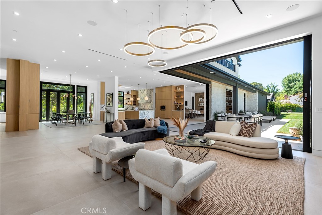23650 Long Valley Road Hidden Hills, CA 91302 - Photo 8 of 57 a living room with furniture and a large window