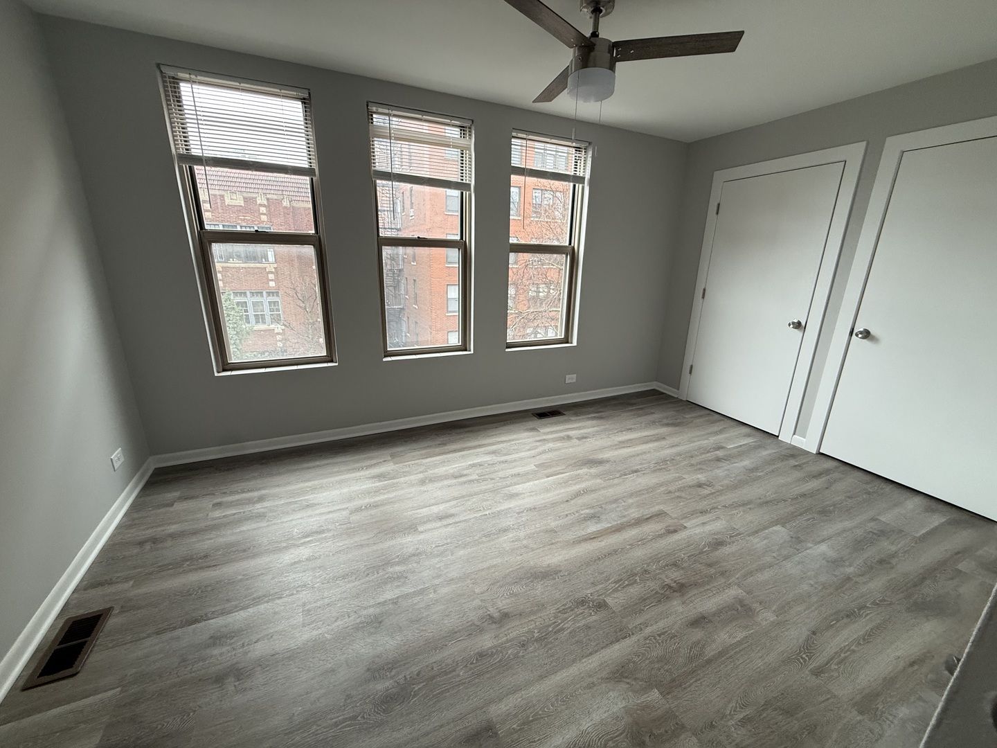 744 West Gordon Terrace, Unit 301 Chicago, IL 60613 - Photo 9 of 13 a view of an empty room with a window