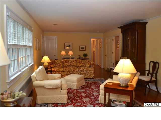 1715 Meadowbrook Heights Road Charlottesville, VA 22901 - Photo 4 of 23 View of living room back to foyer. New windows throughout as well as soy-based insulation blown in crawl space below and attic above make this an energy efficient home.