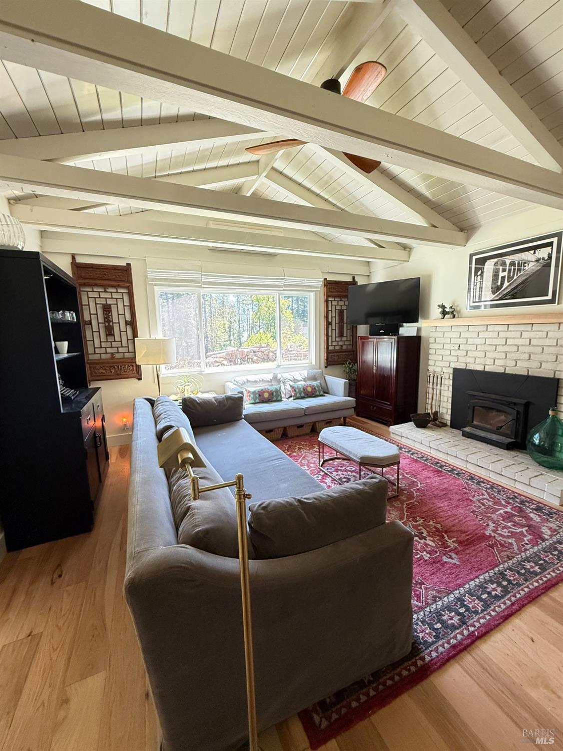 28800 Seaview Road Cazadero, CA 95421 - Photo 2 of 14 a living room with furniture and a fireplace