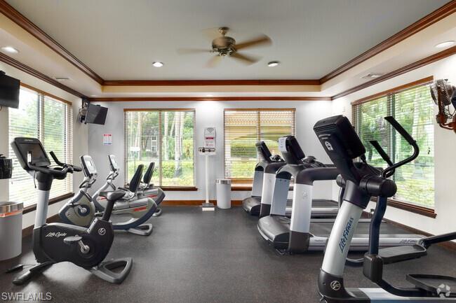 1200 Reserve Way, Unit 201 Naples, FL 34105 - Photo 17 of 20 a view of a room with gym equipment