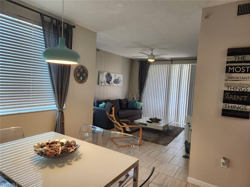 1200 Reserve Way, Unit 201 Naples, FL 34105 - Photo 5 of 20 a view of a workspace with furniture