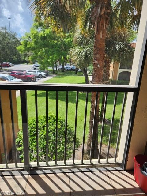 1200 Reserve Way, Unit 201 Naples, FL 34105 - Photo 9 of 20 a view of outdoor space and yard