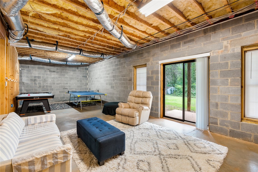 1447 3 Bridges Road Easley, SC 29642 - Photo 34 of 49 Basement Recreation Area