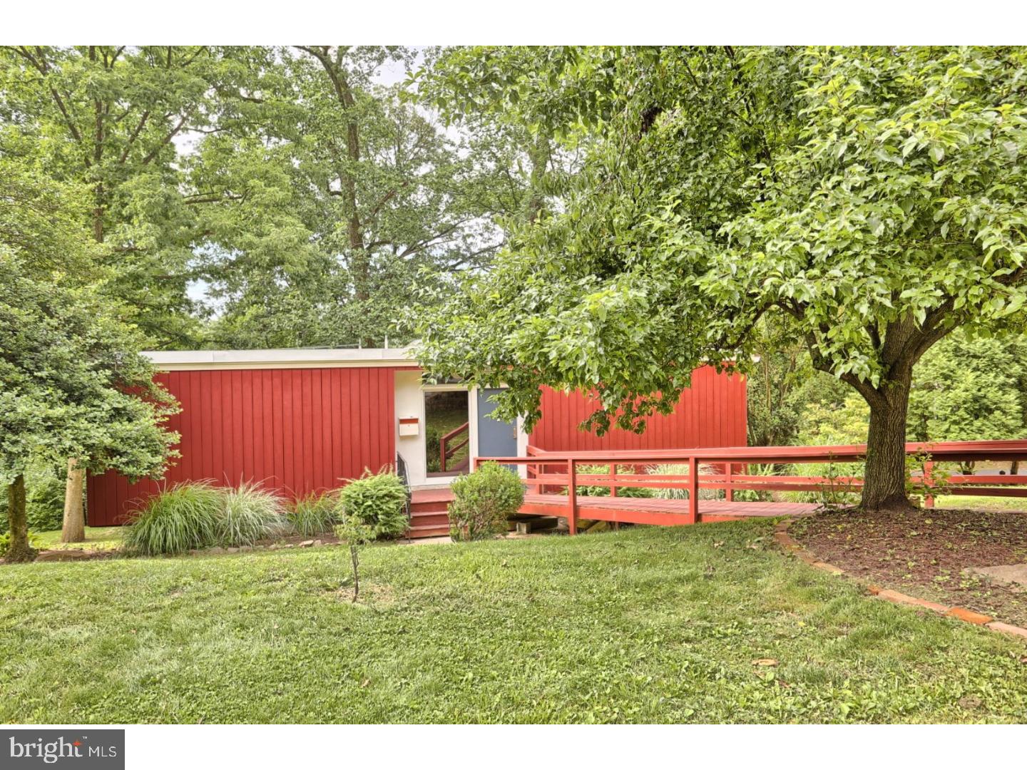 1716 Hill Road Reading, PA 19602 - Photo 2 of 24 a backyard of a house with lots of green space