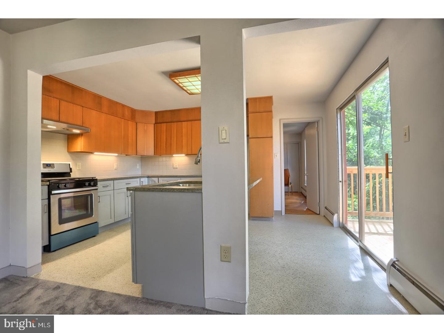 1716 Hill Road Reading, PA 19602 - Photo 12 of 24 a kitchen with cabinets and a refrigerator