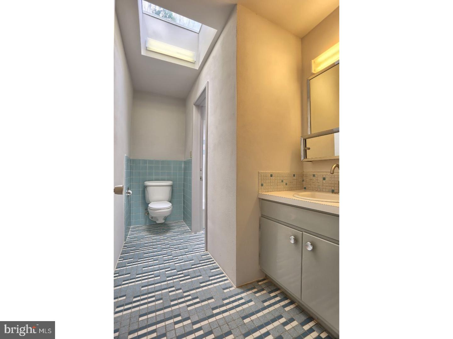 1716 Hill Road Reading, PA 19602 - Photo 14 of 24 a bathroom with a sink and a mirror