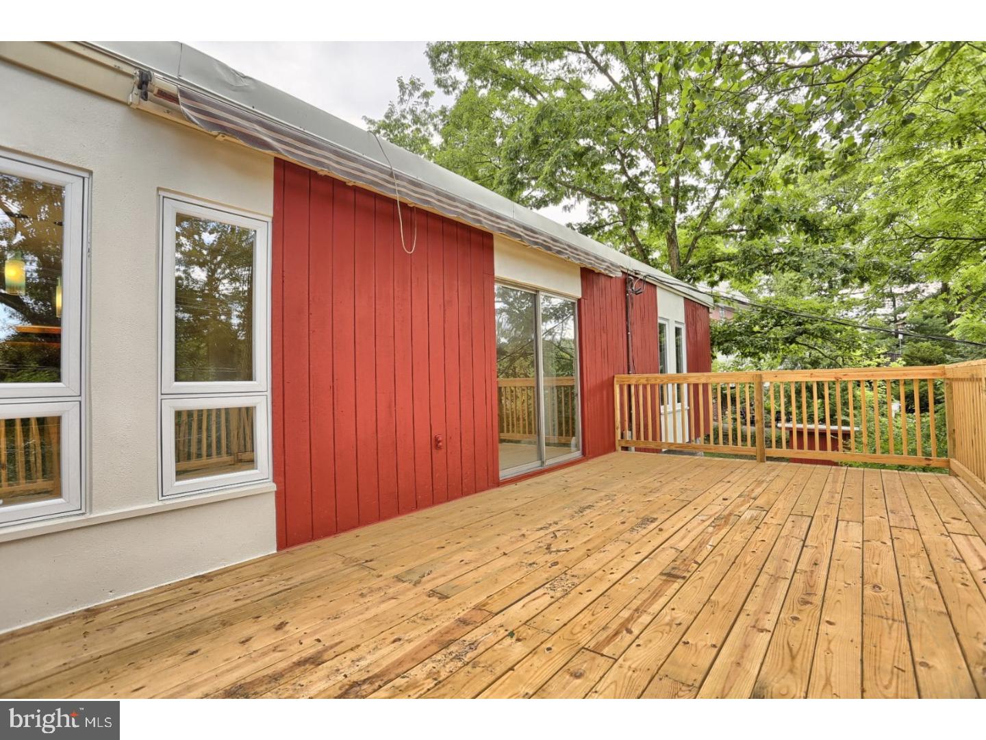 1716 Hill Road Reading, PA 19602 - Photo 23 of 24 a view of backyard with a deck and wooden floor
