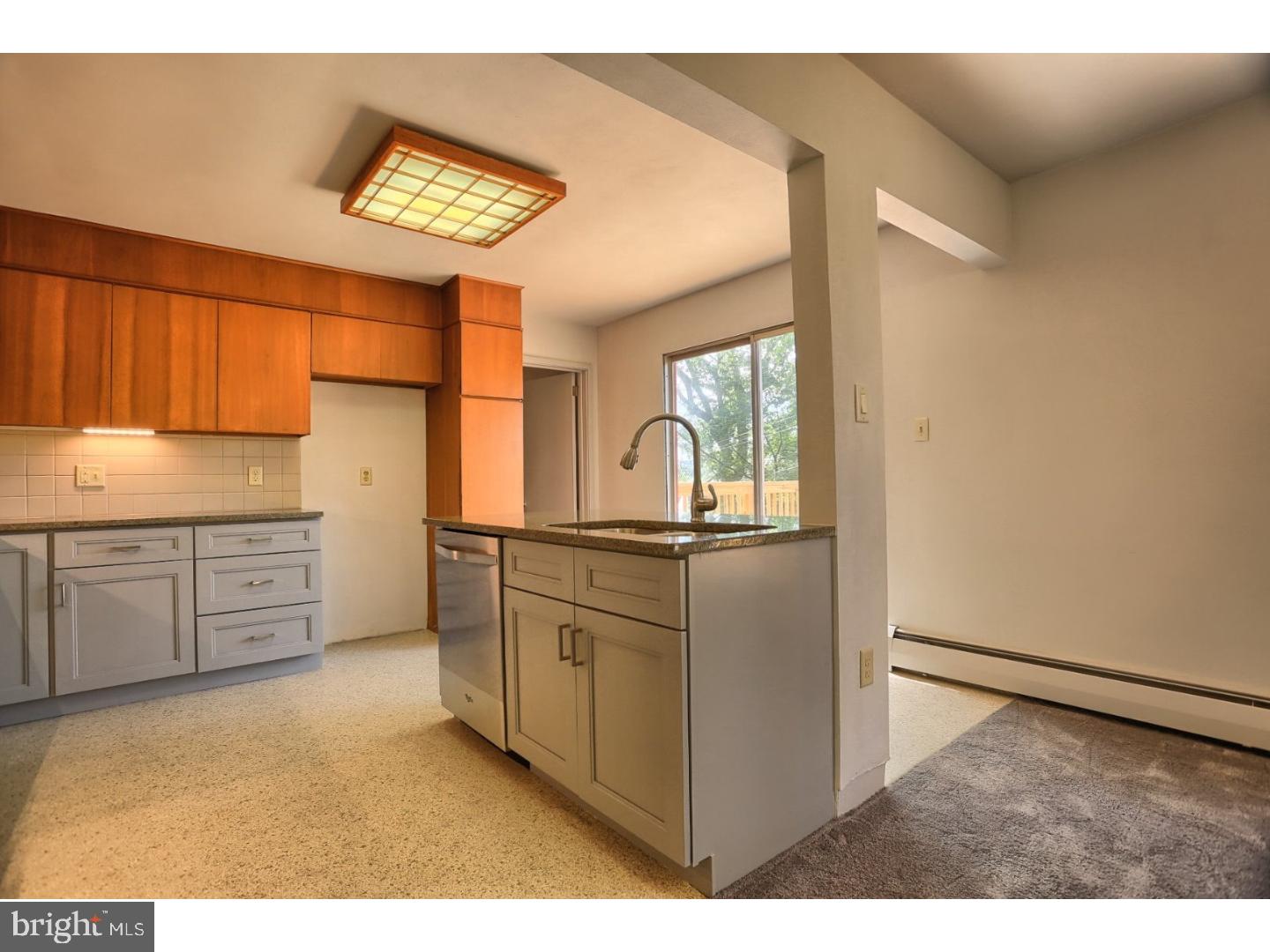1716 Hill Road Reading, PA 19602 - Photo 8 of 24 a kitchen with stainless steel appliances granite countertop a refrigerator and a stove top oven