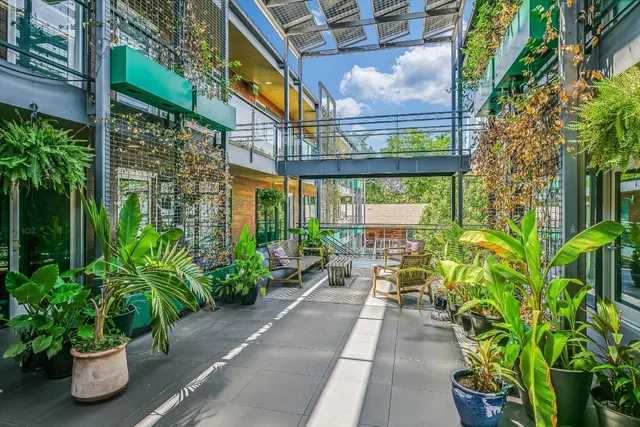 a lobby with chair and table