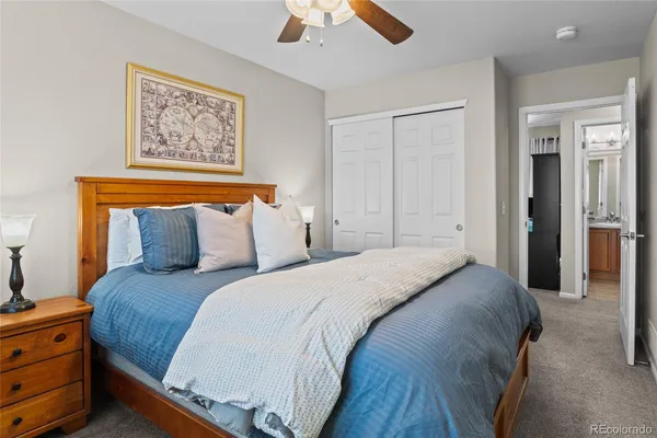 a bedroom with bed and window