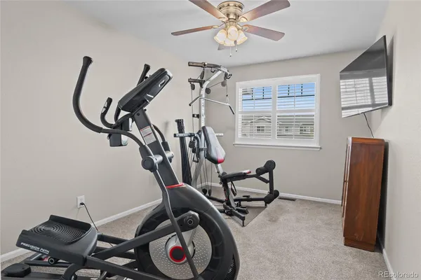 a view of a room with gym equipment