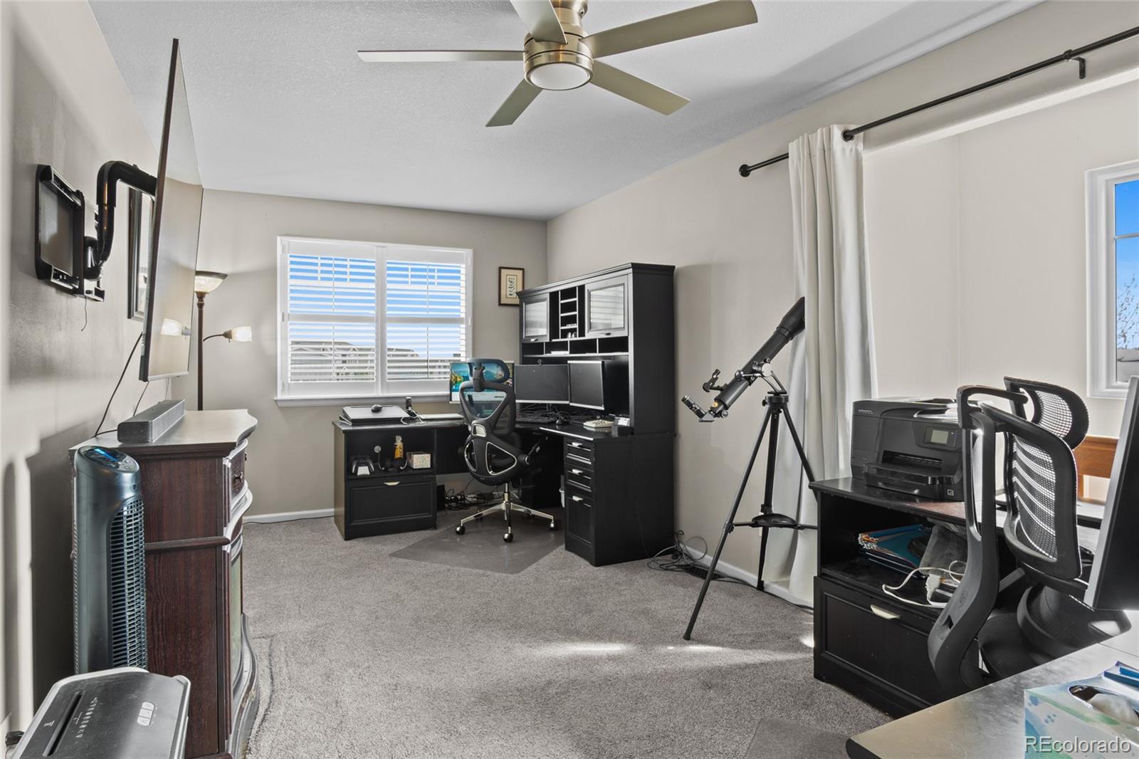 10550 Paris Street, Unit 705 Henderson, CO 80640 - Photo 21 of 30 a view of a room with gym equipment