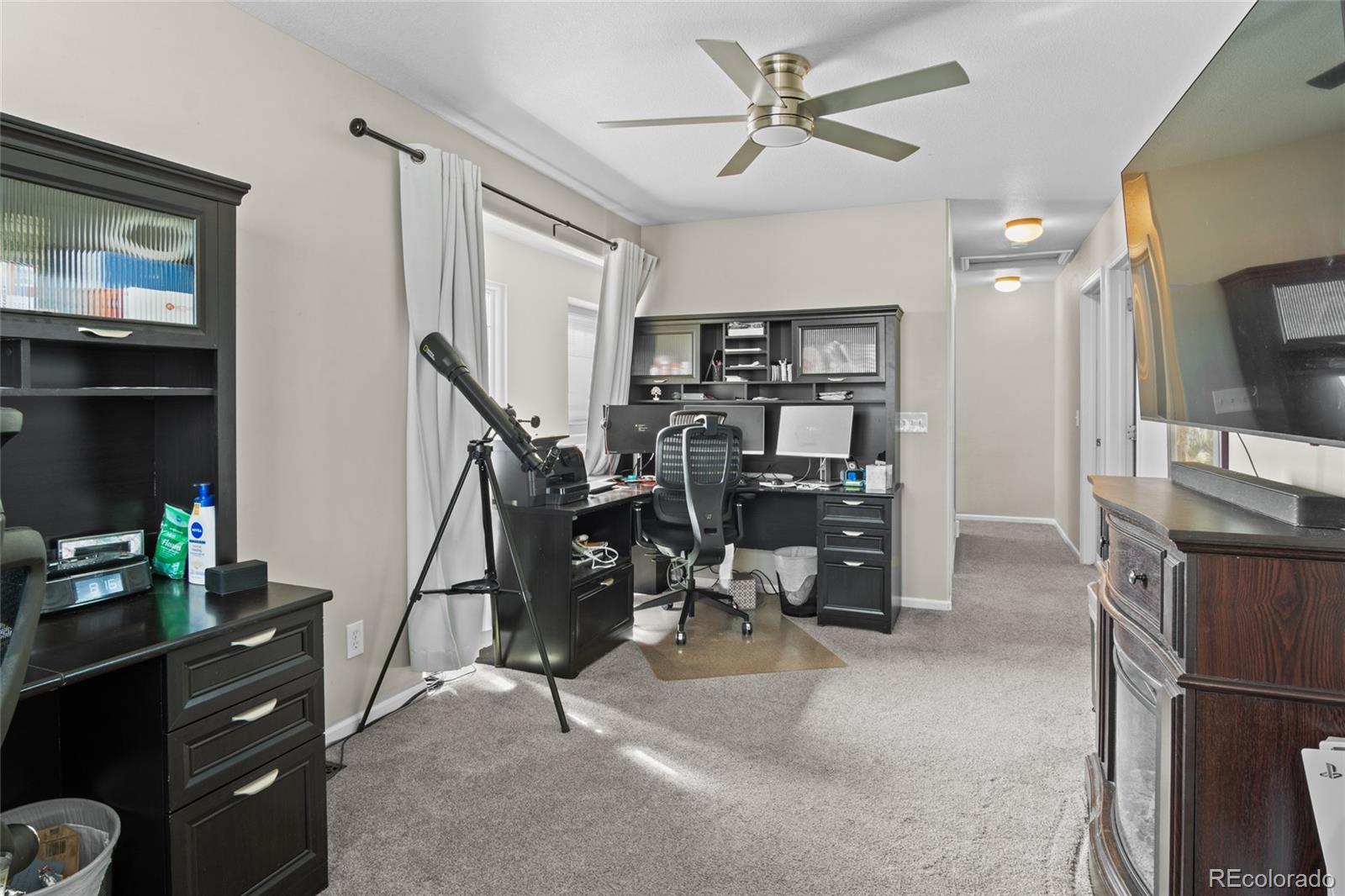 10550 Paris Street, Unit 705 Henderson, CO 80640 - Photo 22 of 30 a view of a workspace with furniture