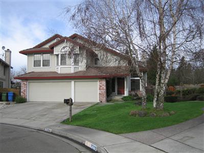 7269 Roxanne Lane Rohnert Park, CA 94928 - Photo 1 of 11 a view of a white house with a big yard and large tree