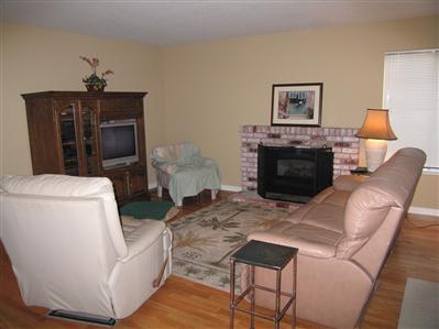 7269 Roxanne Lane Rohnert Park, CA 94928 - Photo 8 of 11 a living room with furniture and a fireplace