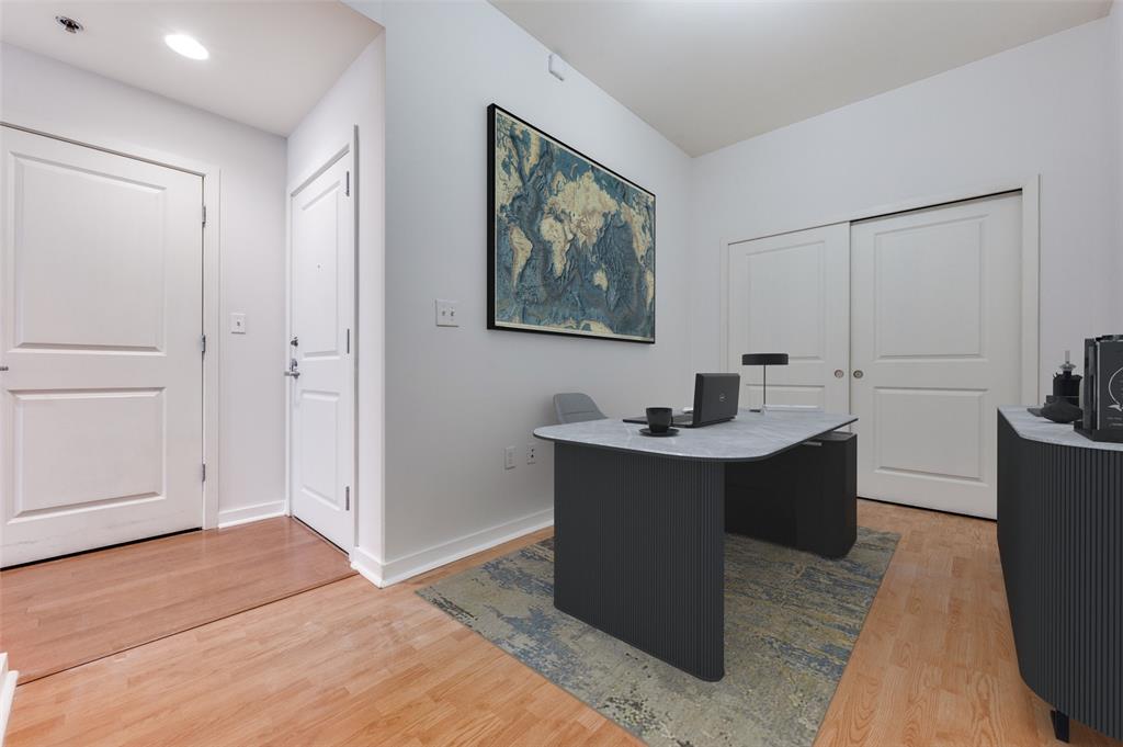 1200 Main Street, Unit 1908 Dallas, TX 75202 - Photo 14 of 27 a view of a workspace with furniture