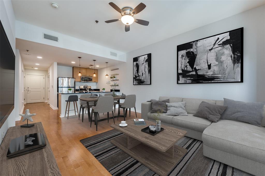 1200 Main Street, Unit 1908 Dallas, TX 75202 - Photo 4 of 27 a living room with furniture and wooden floor