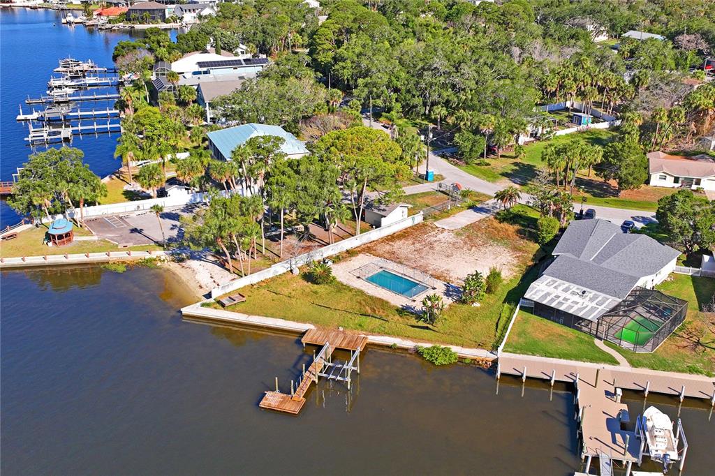 5224 Miller Bayou Drive Port Richey, FL 34668 - Photo 17 of 24 an aerial view of a chairs and table on the patio