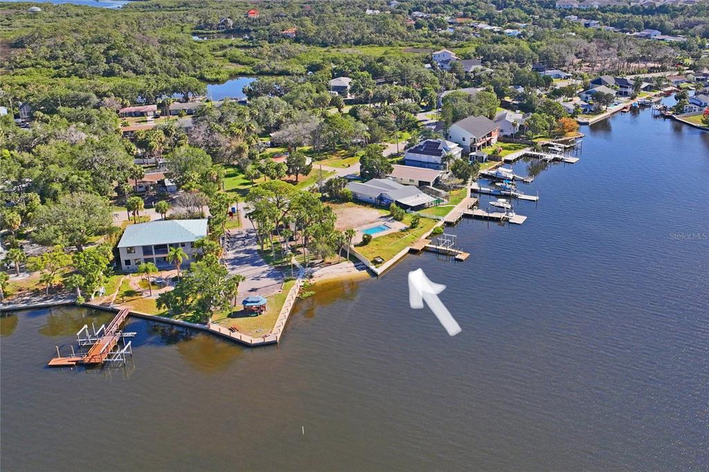 5224 Miller Bayou Drive Port Richey, FL 34668 - Photo 20 of 24 an aerial view of a house with a garden space