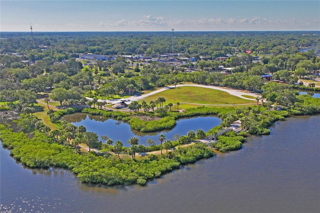 5224 Miller Bayou Drive Port Richey, FL 34668 - Photo 10 of 24 an aerial view of a house