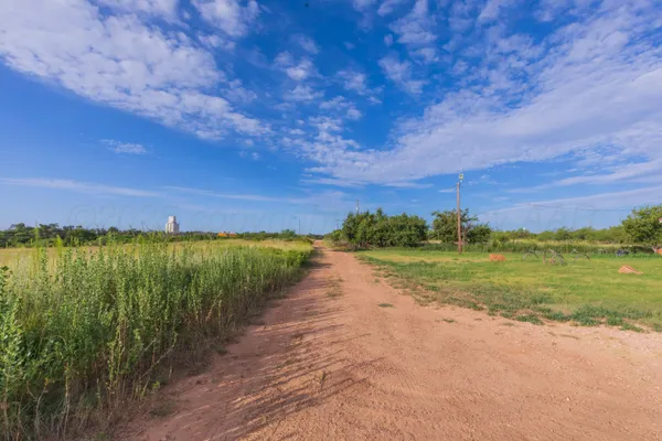 a view of an ocean with a mountain
