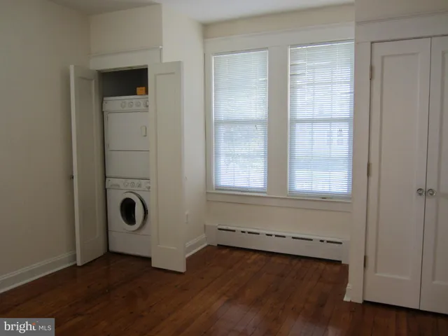 a kitchen with stainless steel appliances granite countertop a refrigerator sink and cabinets