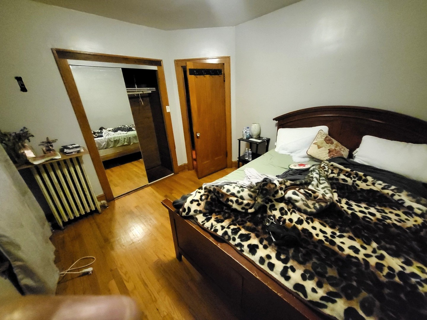2939 North Lotus Avenue Chicago, IL 60641 - Photo 6 of 33 a bedroom with a bed and wooden floor