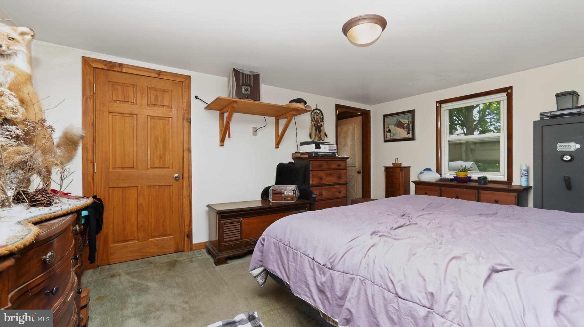 1599 Sanctuary Road Manheim, PA 17545 - Photo 39 of 66 Cozy bedroom with rustic charm.