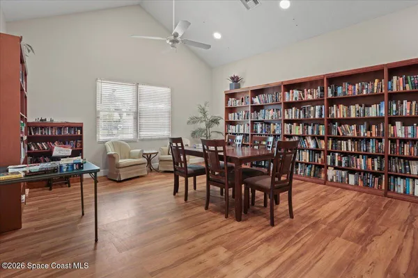 a kitchen with stainless steel appliances granite countertop a refrigerator sink and stove