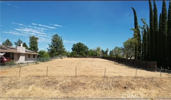 a view of a lake with a big yard