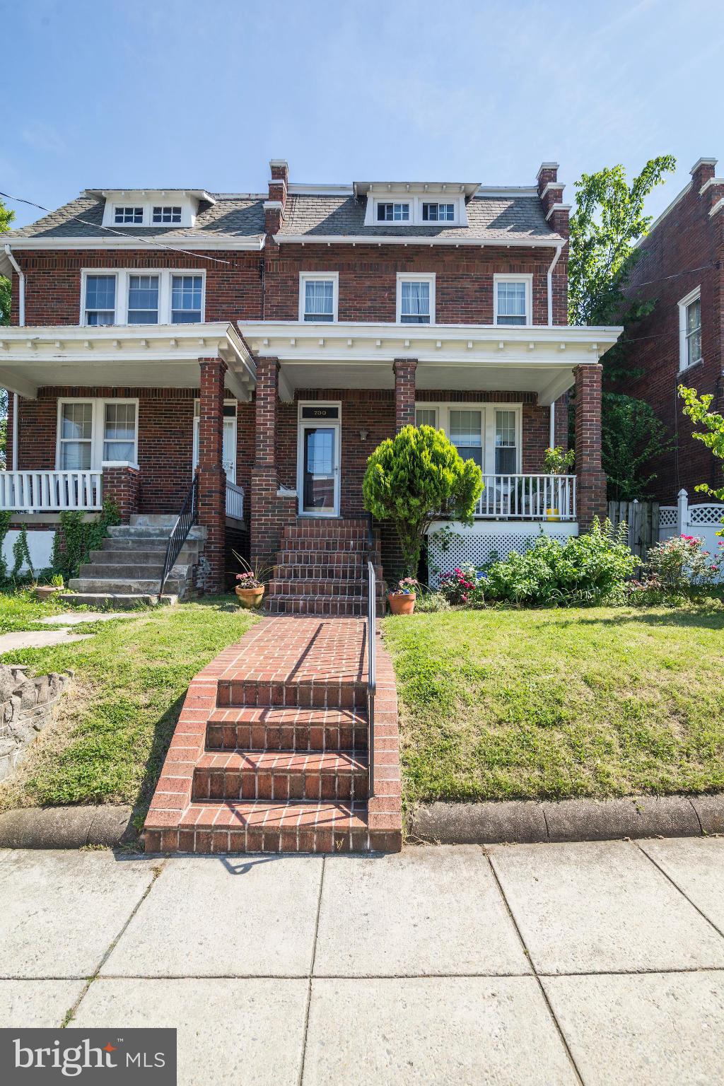 730 Rittenhouse Street Northwest Washington, DC 20011 - Photo 2 of 30 a front view of a house with a yard