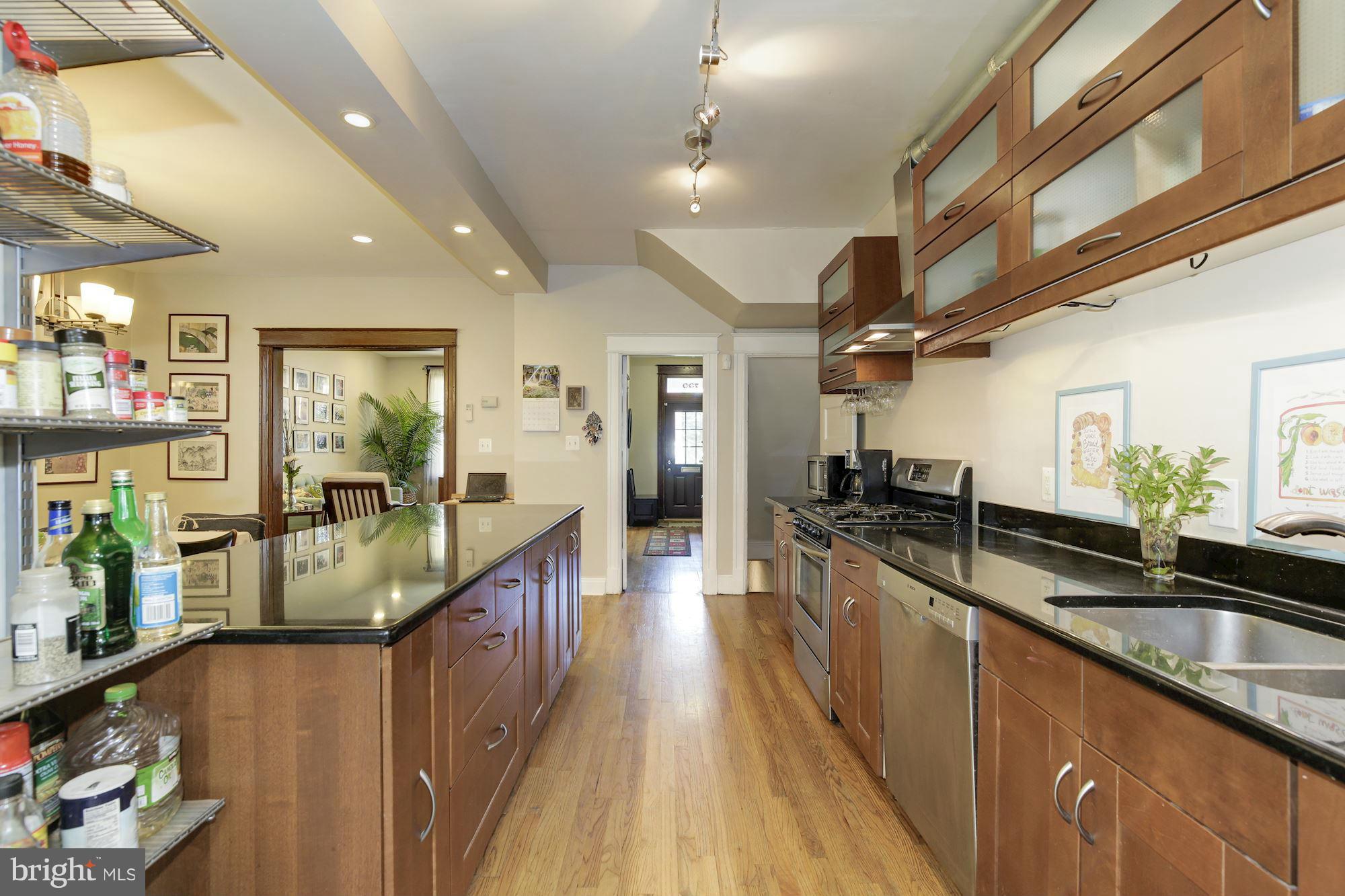 730 Rittenhouse Street Northwest Washington, DC 20011 - Photo 11 of 30 a kitchen with counter top space and stainless steel appliances