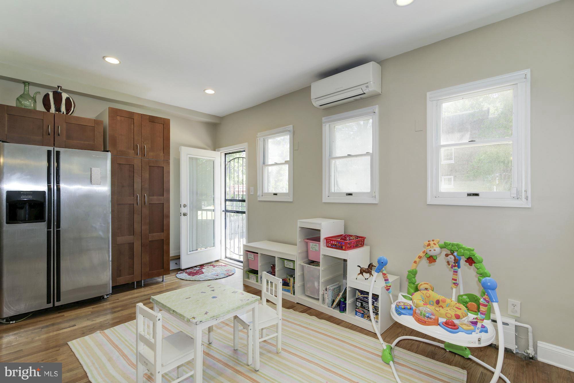 730 Rittenhouse Street Northwest Washington, DC 20011 - Photo 14 of 30 a playing room with furniture and a wooden floor
