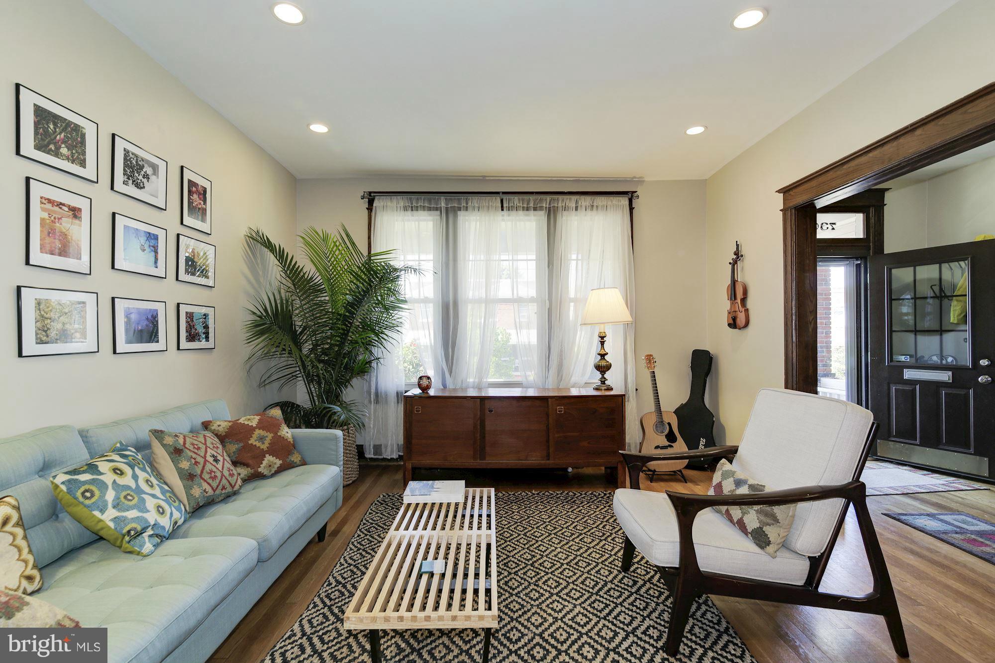 730 Rittenhouse Street Northwest Washington, DC 20011 - Photo 5 of 30 a living room with furniture and a window