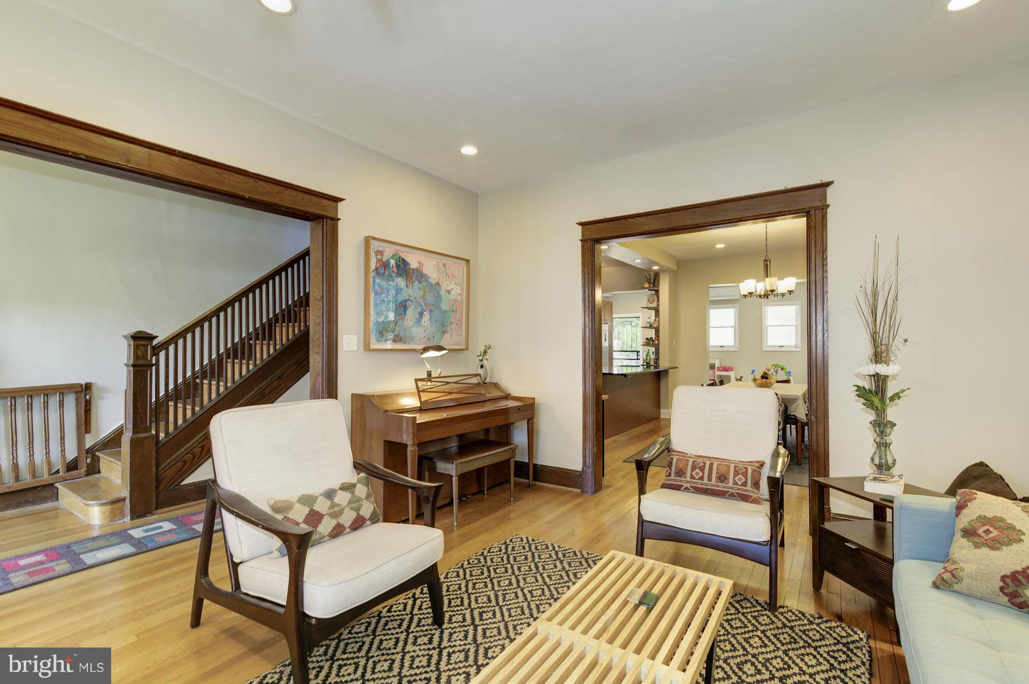 730 Rittenhouse Street Northwest Washington, DC 20011 - Photo 7 of 30 a living room with furniture and a wooden floor