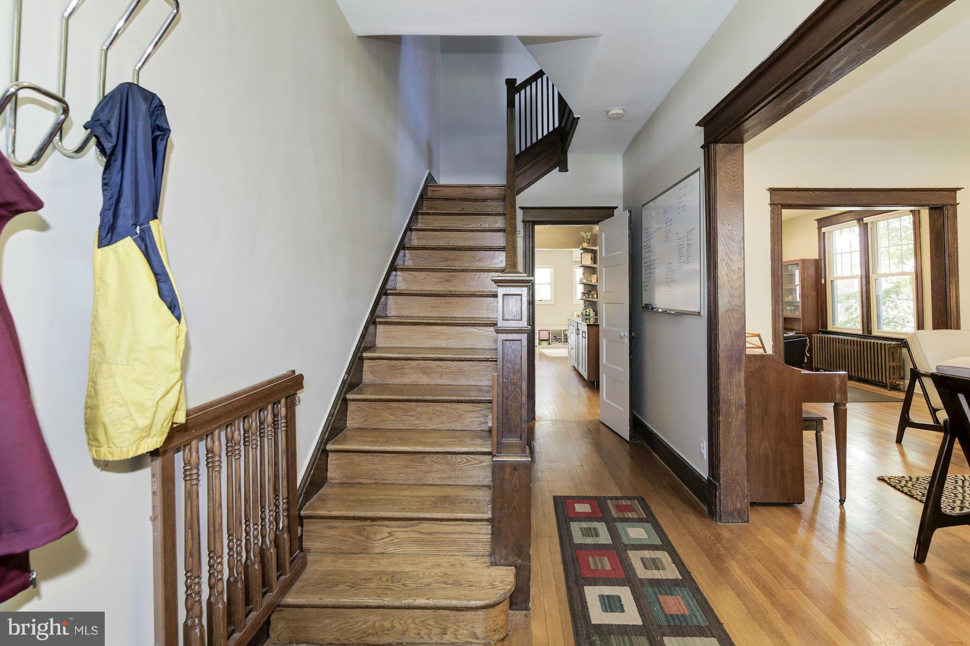 730 Rittenhouse Street Northwest Washington, DC 20011 - Photo 8 of 30 a view of a hallway with wooden floor and staircase