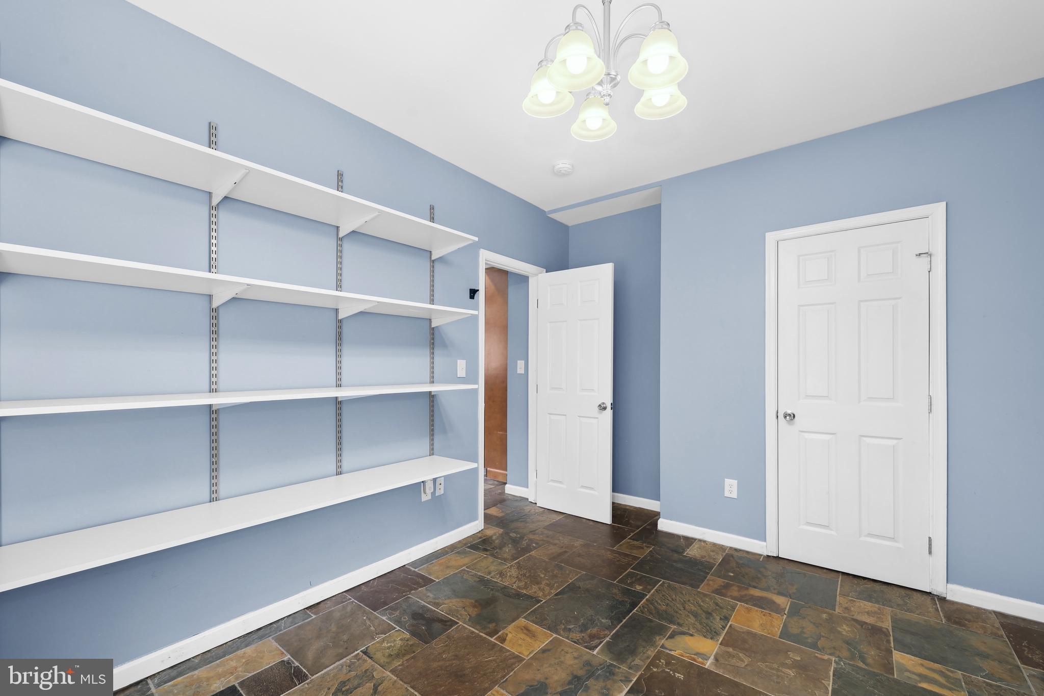 7103 Catlett Road Bealeton, VA 22712 - Photo 12 of 42 a view of an empty room with a window