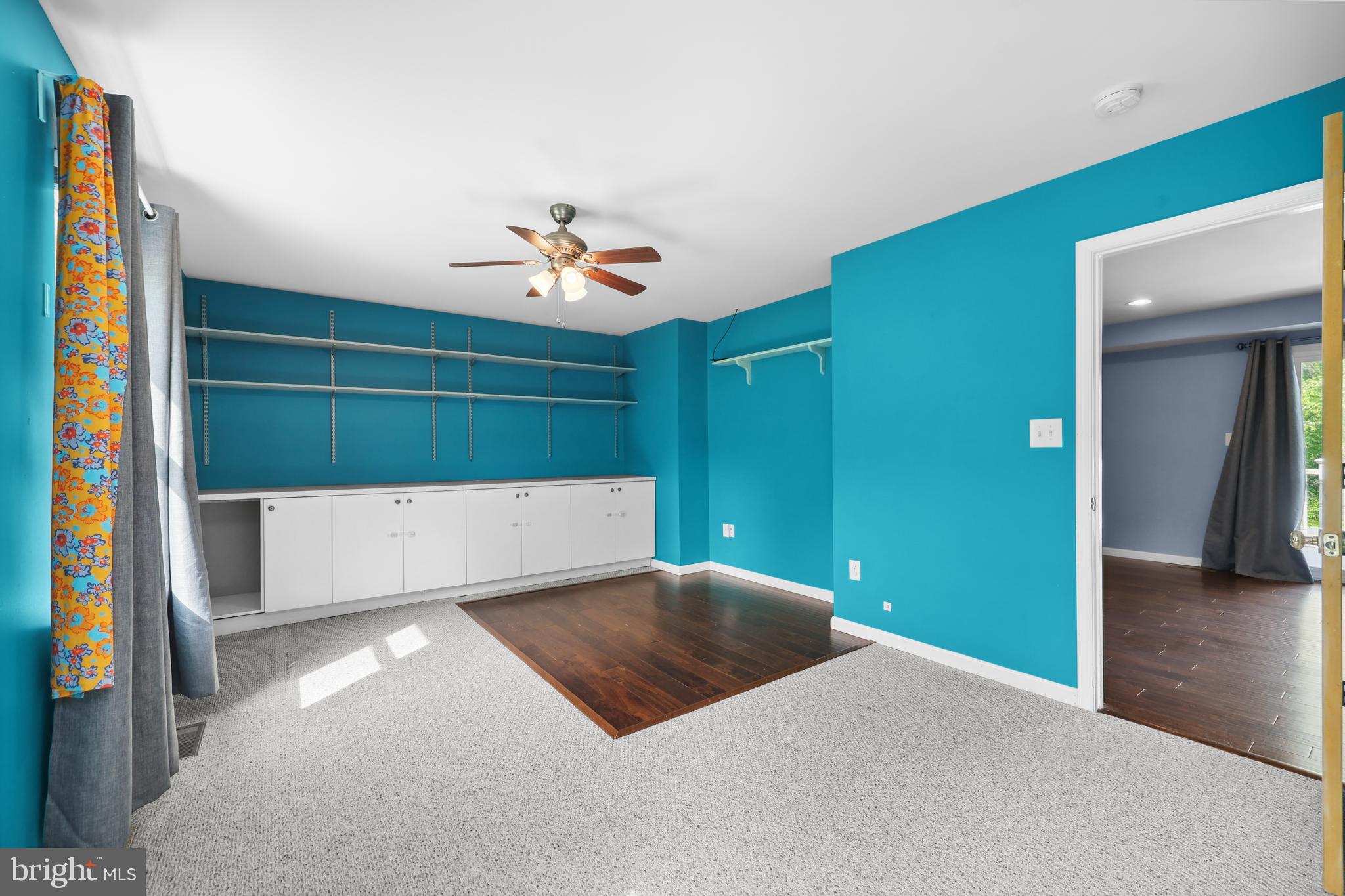 7103 Catlett Road Bealeton, VA 22712 - Photo 30 of 42 a view of a bedroom with a bed and cabinet