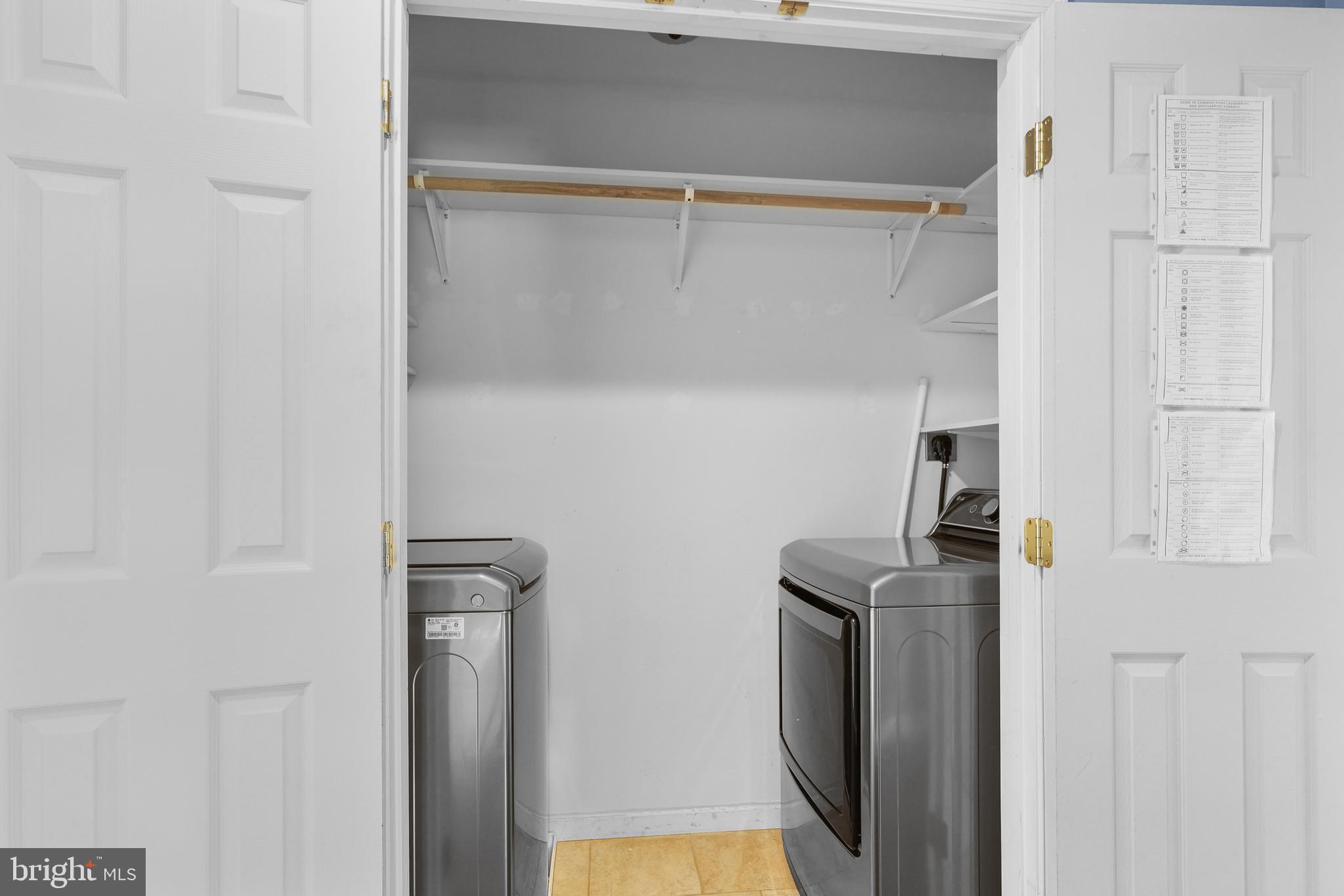 7103 Catlett Road Bealeton, VA 22712 - Photo 34 of 42 a view of storage and utility room with washer and dryer