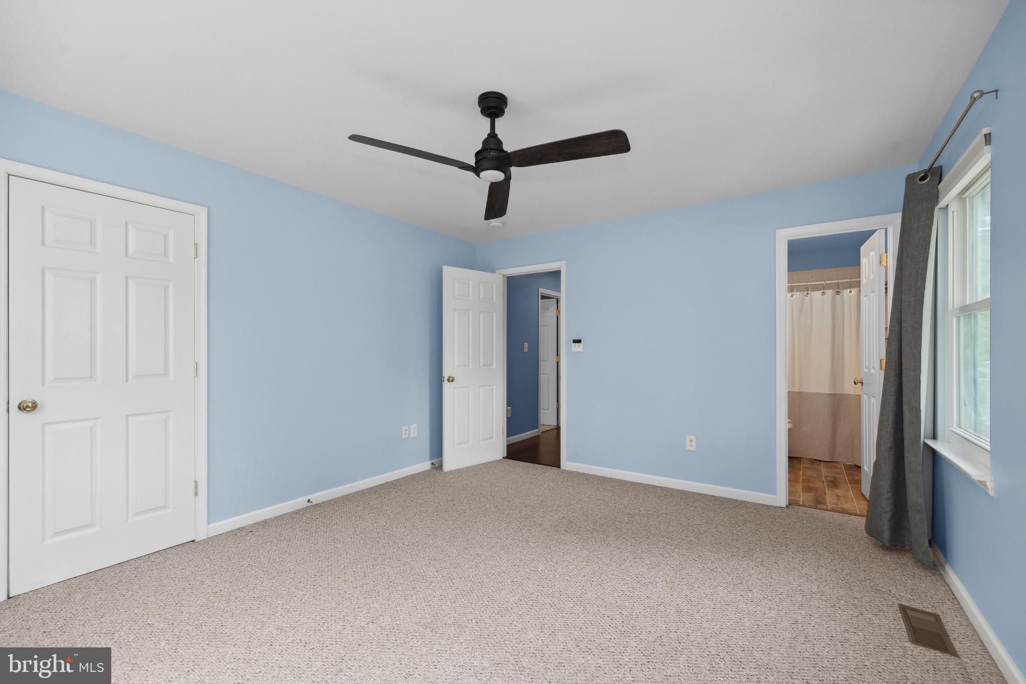 7103 Catlett Road Bealeton, VA 22712 - Photo 36 of 42 a view of empty room with windows