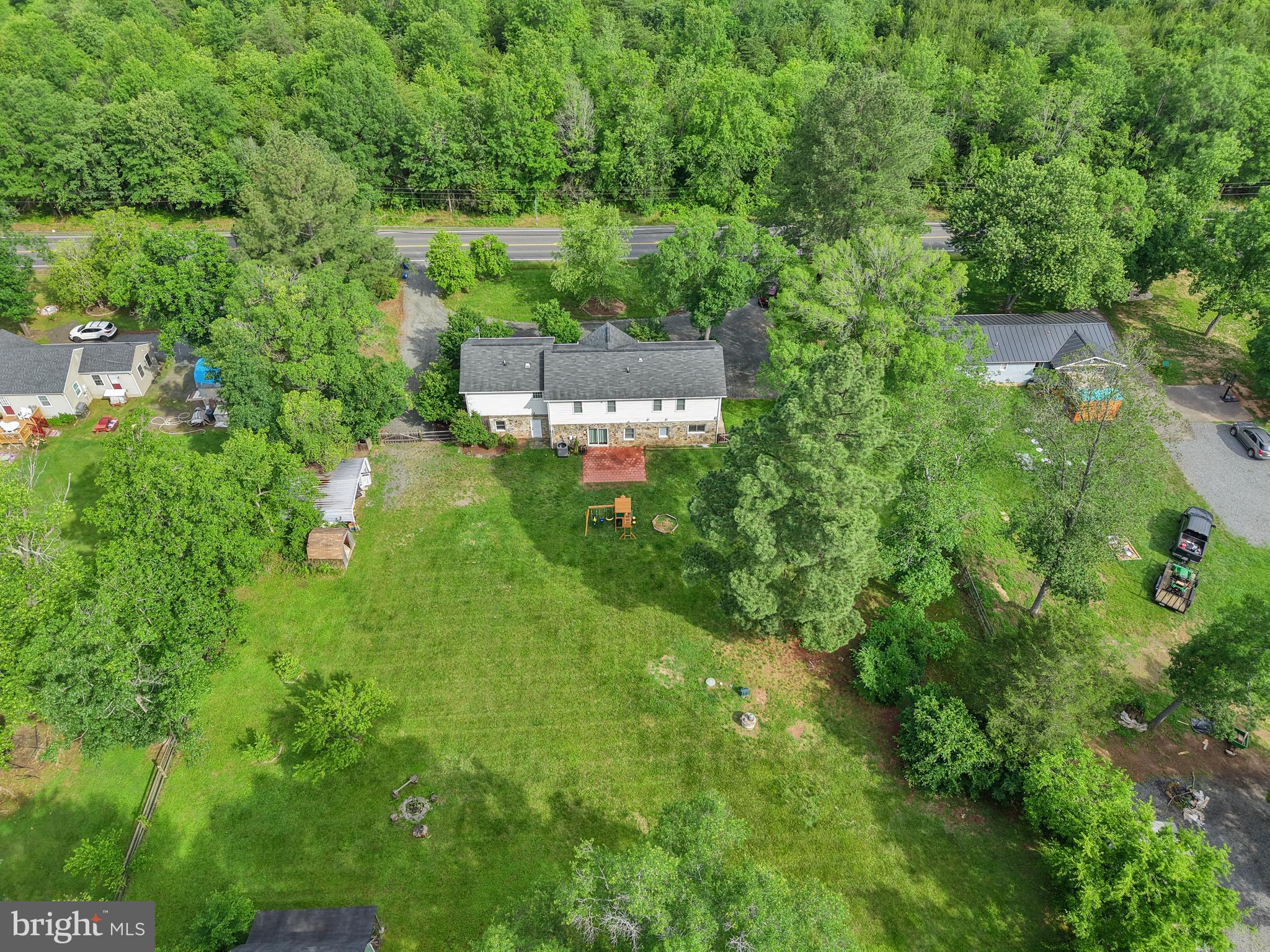 7103 Catlett Road Bealeton, VA 22712 - Photo 40 of 42 an aerial view of residential house with outdoor space and trees all around