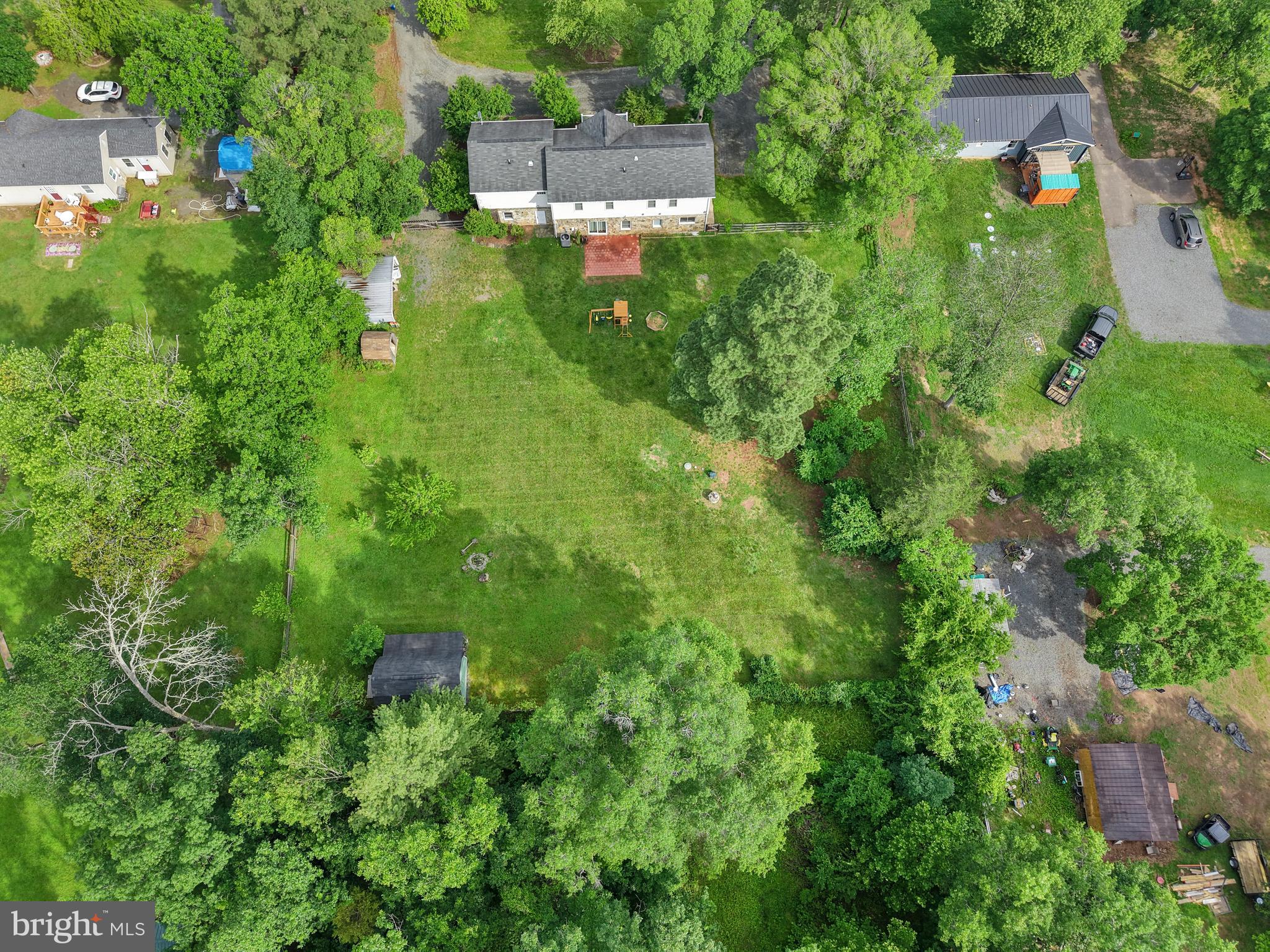 7103 Catlett Road Bealeton, VA 22712 - Photo 4 of 42 an aerial view of residential house with outdoor space and trees all around