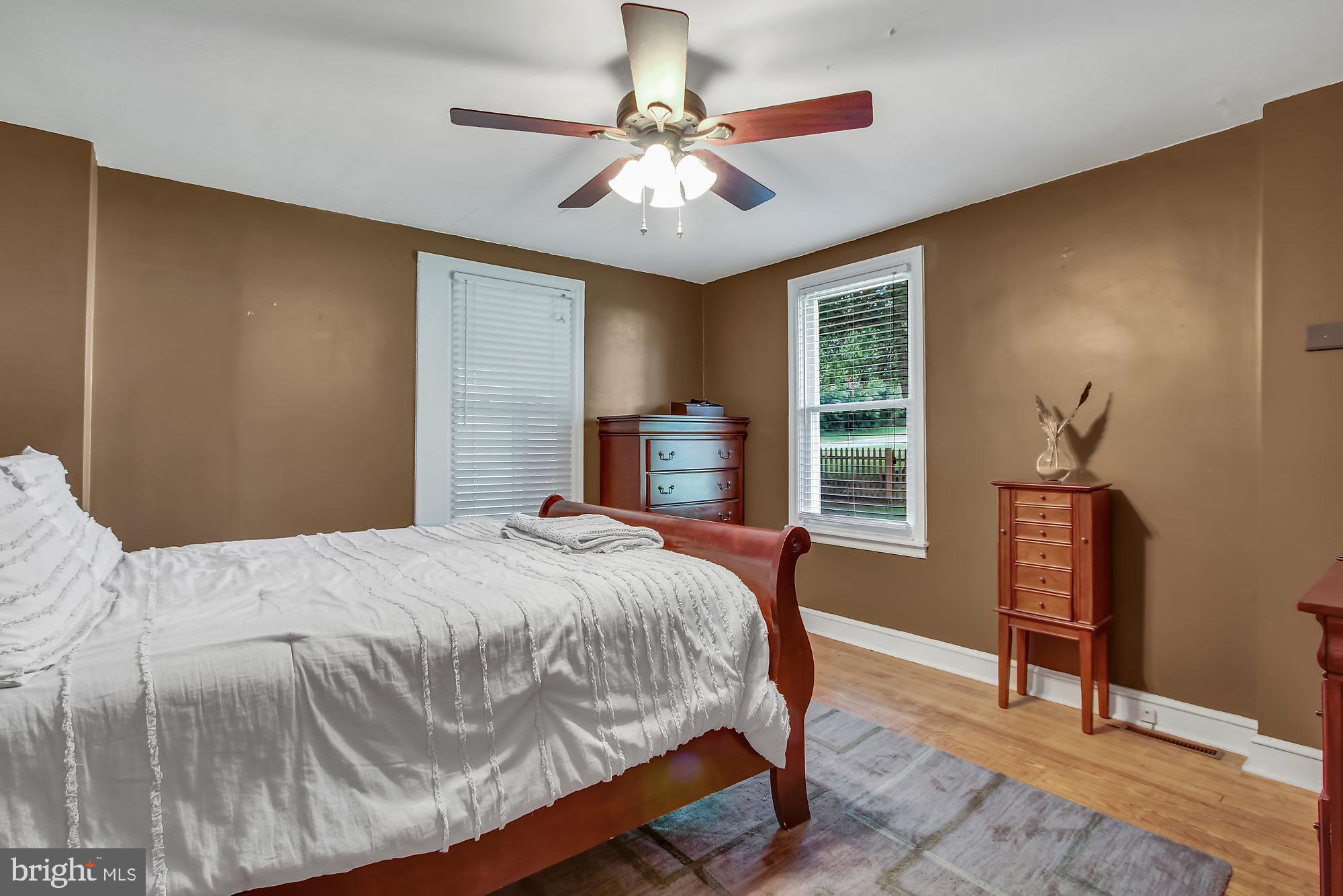 10 Boxwood Road Manchester, PA 17345 - Photo 12 of 25 1st floor bedroom with hardwood flooring